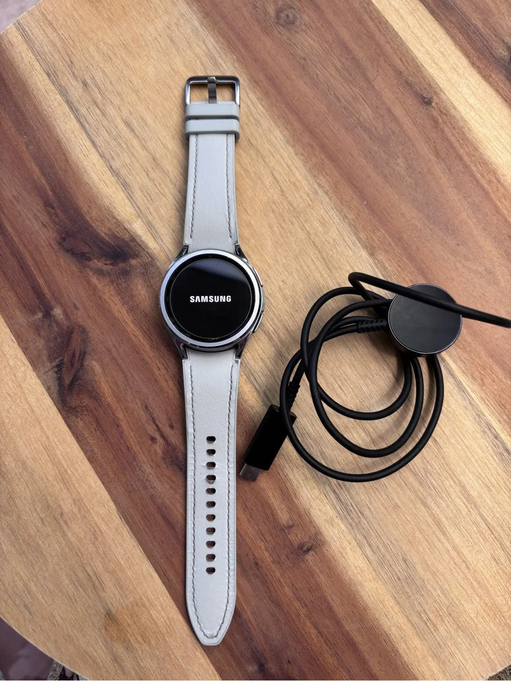 Samsung Silver Smartwatch with White Leather Band and Charger